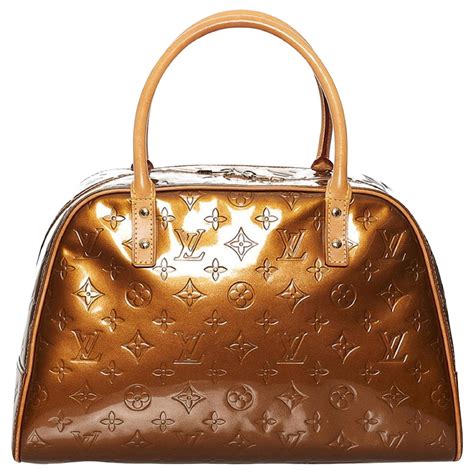 Tompkins square leather handbag Louis Vuitton Brown in Leather 